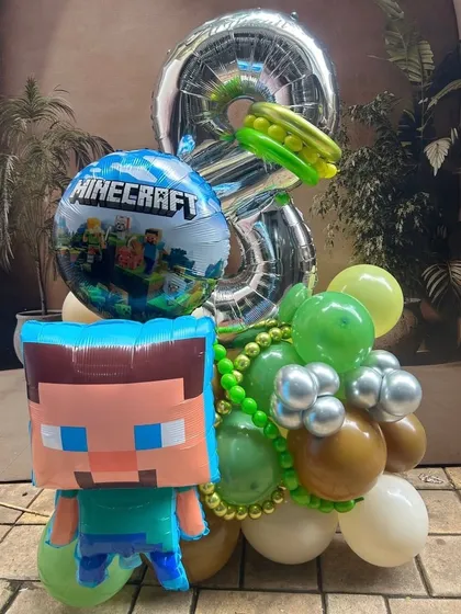 Another version of our Minecraft balloon bouquet, this one includes a branded Minecraft foil balloon along with the Steve character and the birthday number.