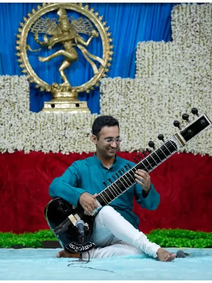 Performing in front of a Nataraja idol in Kerala, a beautiful setting for a devotional and classical music evening.