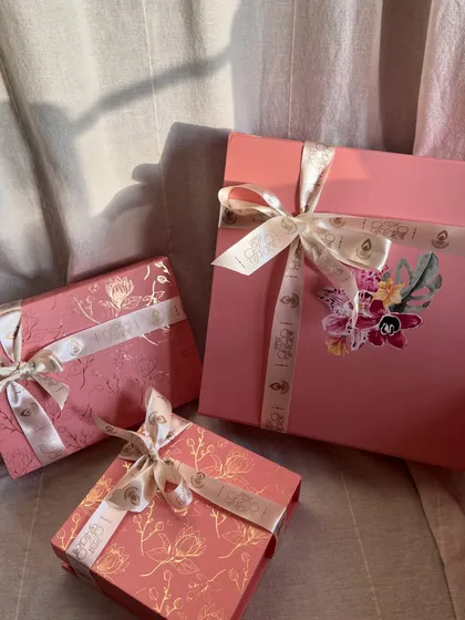 I really love the packaging I chose for Diwali. This shot focuses on the different sizes of the pink floral boxes, each tied with a custom ribbon. It’s all in the details.