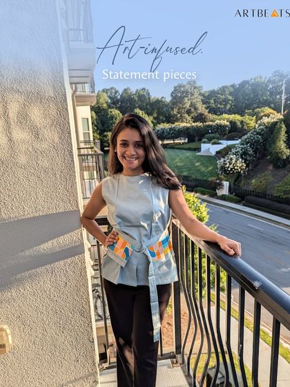 Art-infused statement pieces. The Mint Dawn & Dusk Belt Top is a timeless piece with just enough twist to make it a new favorite in your closet.