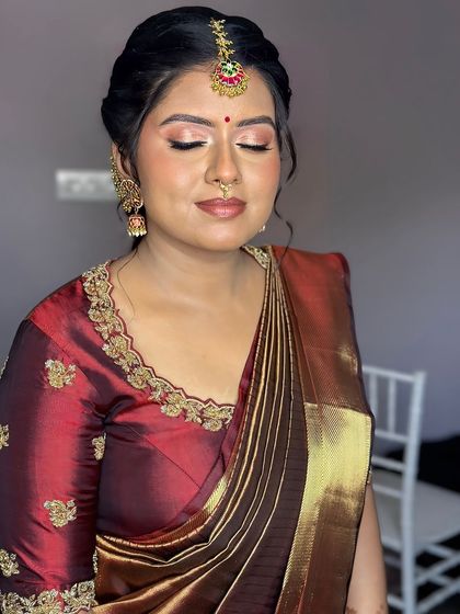 An eyes-closed shot to highlight the soft, shimmery eyeshadow and flawless base.