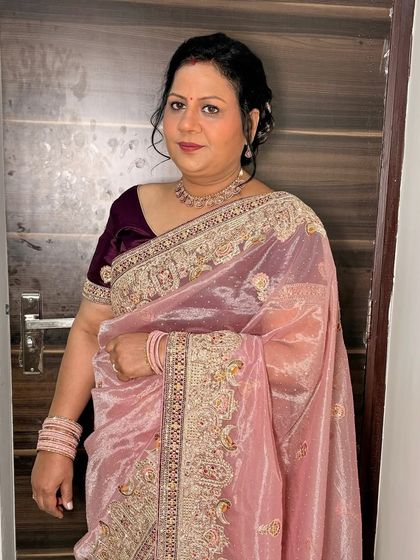 A full-length view of her elegant party look.