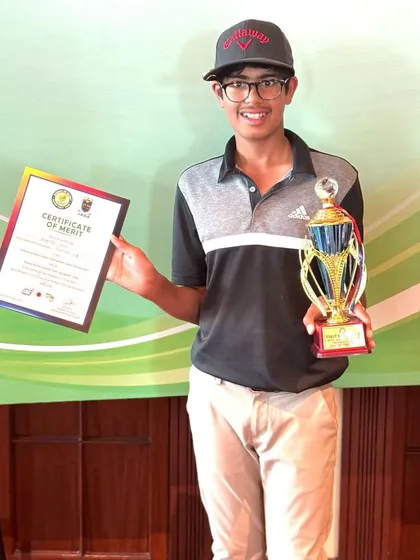 A proud Rayirth Jain holds his runner-up trophy and certificate.