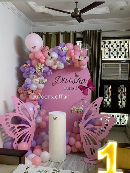 A slightly different view of the pink and purple butterfly home decoration.