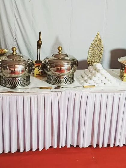 Another angle of the Palam Vihar event, showing the elegant decor pieces used to enhance the buffet table.