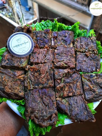 My Paknam, a savory cake made of gram flour, vegetables, and herbs, steamed in turmeric leaves. I've newly added this to my menu.