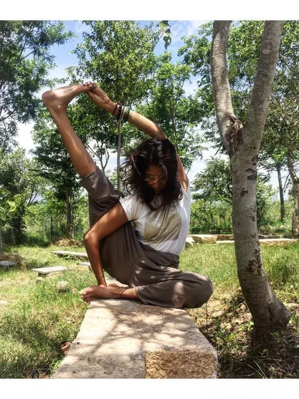 Finding a moment of deep release with Suryayantrasana, or the Compass Pose, while surrounded by nature. A morning stretch outdoors is one of the best ways to wake up the body and quiet the mind before the day begins. This is what our jungle yoga sessions feel like.