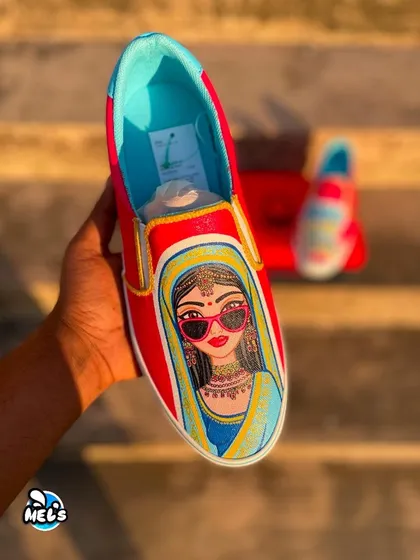 A hand-held shot of the bride illustration sneaker, showing the intricate details of her jewelry and outfit.