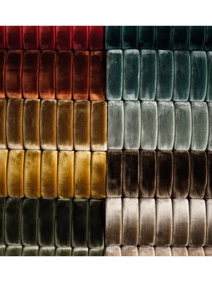 We curate fabrics that are a delight to the senses. These large-scale velvet corduroy fabrics, available in 17 colorways, offer a deeply tactile and luxurious feel. They are also available with a stain-resistant finish, combining opulence with practicality.