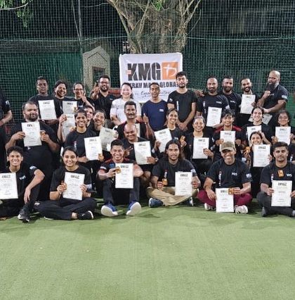Participants from the Goa seminar proudly holding their certificates after completing the Third-Party Protection module and practitioner-level grading.