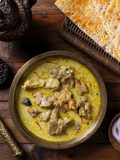 Another angle of the Hyderabadi Mutton Marag, providing a clear view of the saffron-infused stew and tender mutton pieces.