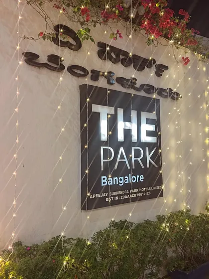 The entrance to The Park Bangalore, adorned with festive lighting. Our branding is integrated with beautiful decor to create a memorable first impression.
