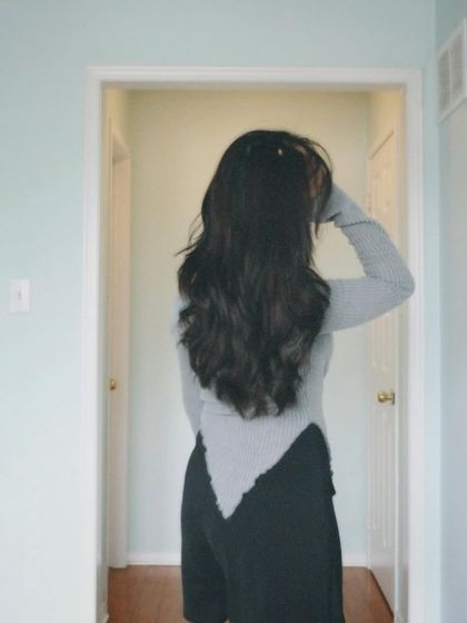 A shot from behind, highlighting my long hair and the back of the outfit.