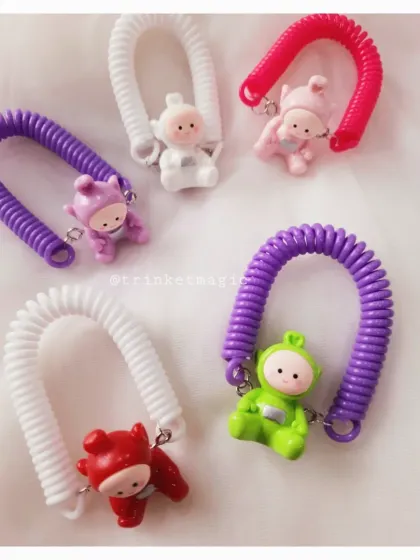 The Teletubbies are here to make Rakhi adorable. These spiral charm Rakhis are super popular with the youngest kids, featuring colorful characters on a soft, adjustable band.
