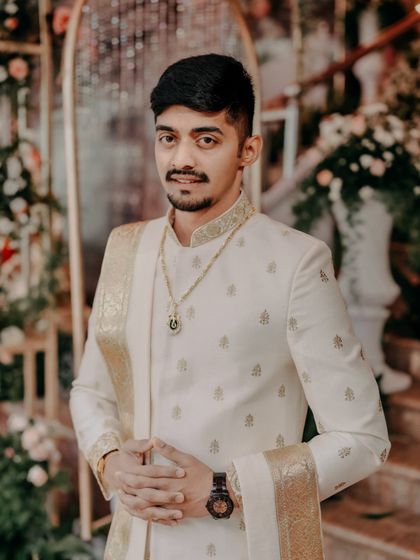 A stylish portrait of the groom in his traditional Muhurtham attire.