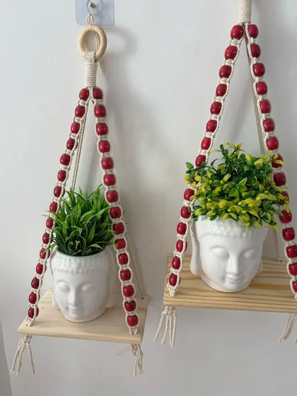 A straight-on shot of the two planter shelves, ready to hold your favorite small plants and brighten up your wall.