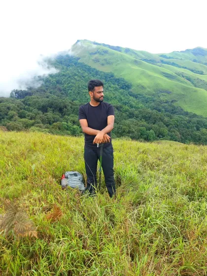 Another shot from the Netravati peak, where the clouds meet the mountains. It's a popular spot for trekkers looking for incredible views near Bangalore.