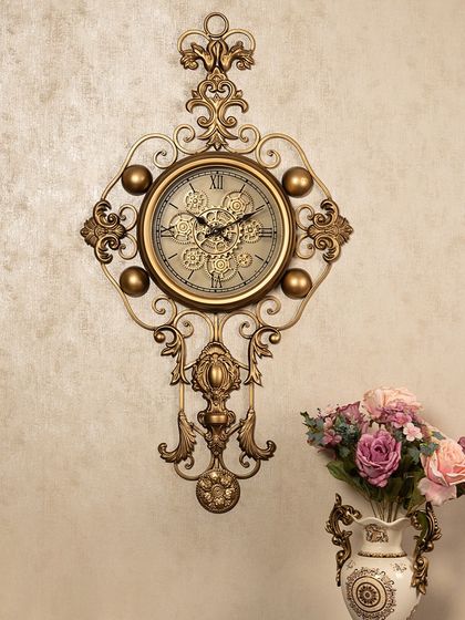 The Grand Florentine luxury designer wall clock is back in stock. This ornate, vintage-inspired piece features intricate gold metalwork and a pendulum, perfect for adding a touch of European elegance.