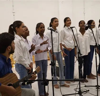 Our Gully Choir students performing together at the showcase. This performance is a testament to their teamwork and the confidence they've built through our regular music classes.