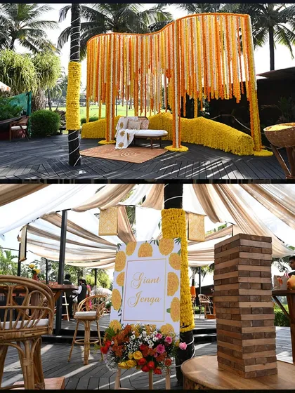 The 'Phoolon Ki Mandi' theme came to life with a canopy of marigold garlands. We also included fun elements like a giant Jenga to keep guests entertained.