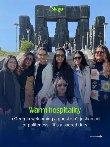 In Georgia, welcoming a guest is a sacred duty. You'll feel the warm hospitality from the moment you arrive, making you feel right at home. Here's our group at the Chronicle of Georgia monument.