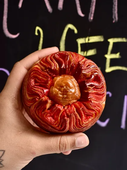 The beautiful, blooming layers of our Chocolate-Hazelnut Bloom Croissant. Each one is a little work of art, made with love for the Rakhi festival.