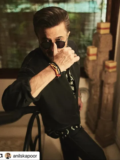 A more relaxed pose from Anil Kapoor, but the hair remains perfectly styled.