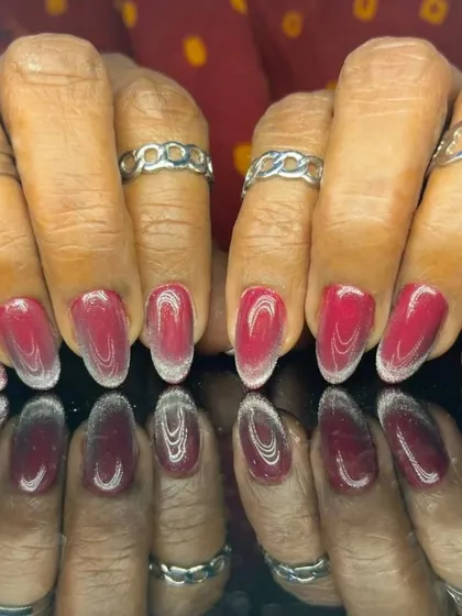 Another view of the striking red and silver glitter ombre, perfect for a festive look.