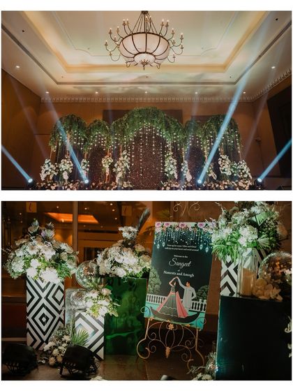 The stunning stage decor for the Sangeet, with cascading greenery and spotlights. We always capture the beautiful ambiance you've created for your event.