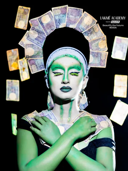 A serene yet powerful portrait from the money-themed series. This demonstrates how to convey a story and emotion through creative makeup and posing.