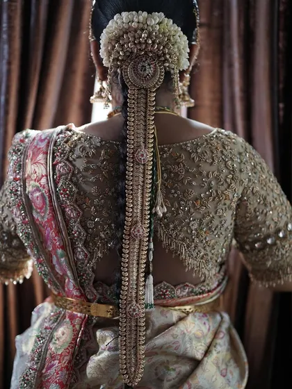 A collection of detailed shots focusing on the diverse and intricate embroidery of my custom blouses. These images highlight the fine craftsmanship, luxurious materials, and unique designs that define my work.