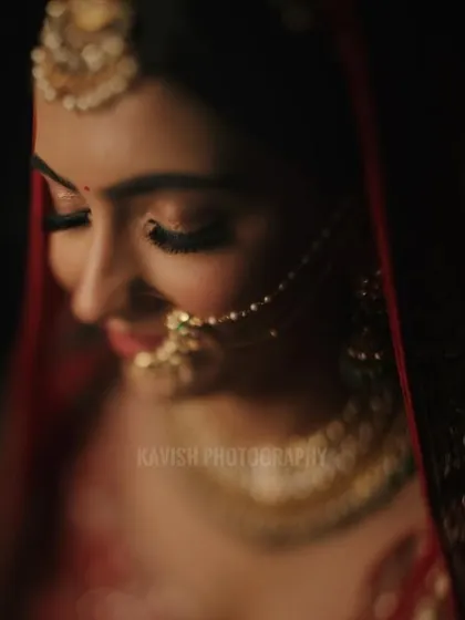 A slightly different angle of the artistic bridal portrait, showing the delicate details of her nose ring.