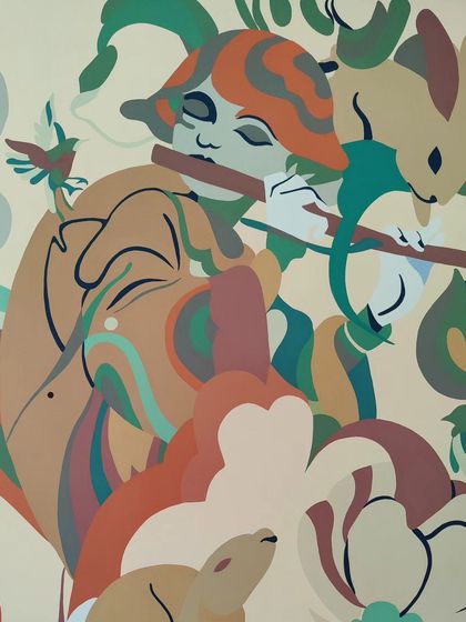 A detail of the playful animals and soft color palette used in the restaurant mural.