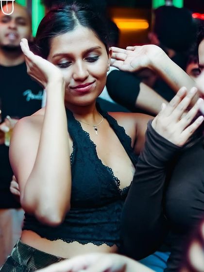 The joy of dancing with friends to your favorite Bollywood tracks. A typical high-energy scene from a night at The Fixx.