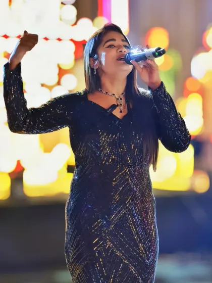 In my element on stage, engaging with the audience during a Sangeet performance. My passion is to connect with the guests and make them a part of the show.