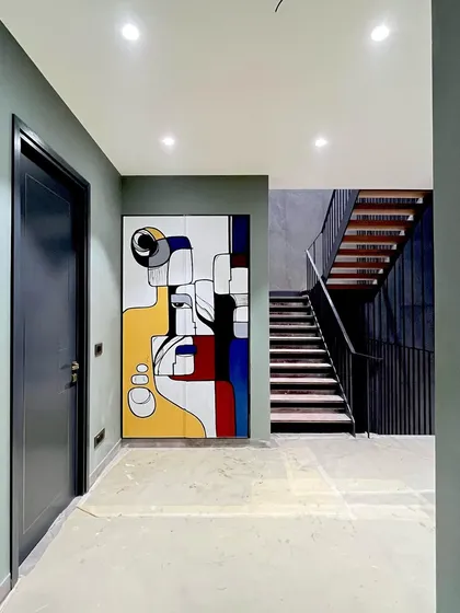 Art isn't just for walls. I hand-painted this wardrobe with a custom abstract design inspired by Picasso, turning a functional piece of furniture into a unique statement piece for a client's home.