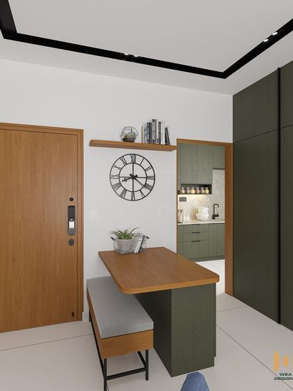 The entrance of the Nano Home, featuring a foldable dining table with bench seating to maximize space.