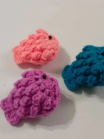 We also create textured amigurumi shapes like these, which can be used as keychains or sensory toys. The bobble stitch provides a unique and interesting feel.
