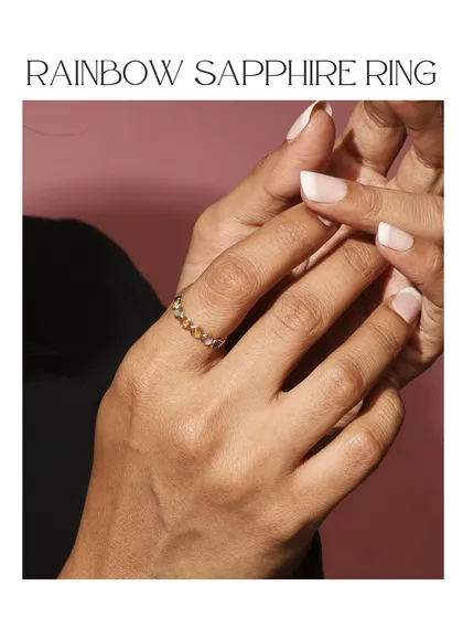 The Rainbow Sapphire Ring, a joyful band of sapphires in every shade. This piece is a celebration of color and is perfect for stacking.