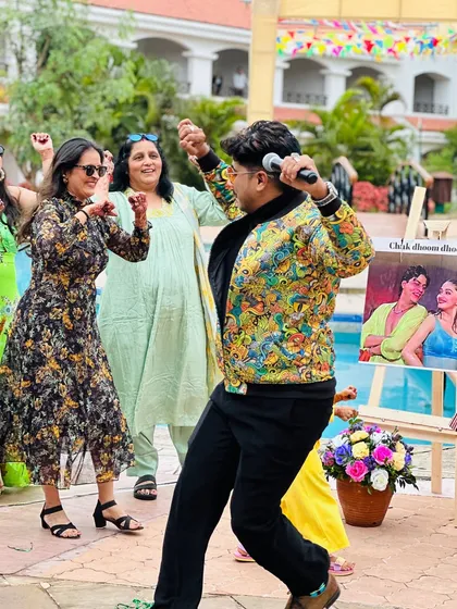 Dancing with the guests at a pool party. My approach is always hands-on; I get off the stage and join the crowd to make sure everyone feels the energy.