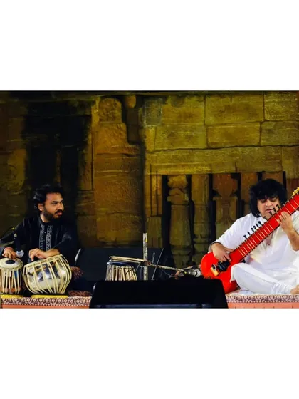 A collection of images from various concerts with the one and only Pandit Niladri Kumar ji. Whether on the sitar or his Zitar, every concert with him is a masterclass in creativity.