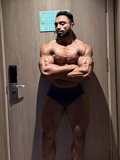 Another arms-crossed pose. The mental game is as important as the physical.