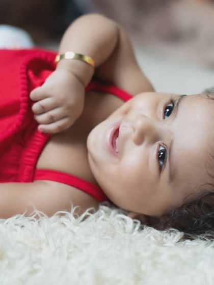 This little one's joyful expression is simply contagious.