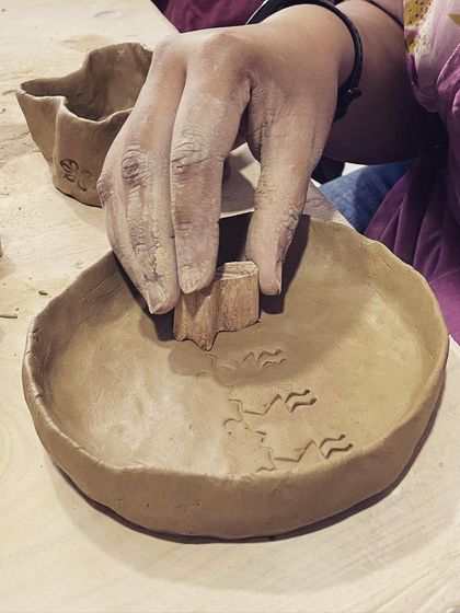 Using wooden stamps to create patterns is a fun and easy way to decorate your hand-built pieces.