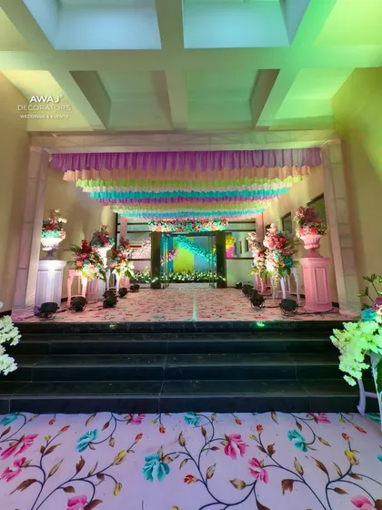 The view from the bottom of the stairs, looking into the beautifully decorated event hall.