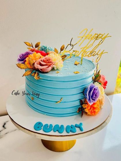 A floral symphony in blue. This cake is a beautiful combination of color and texture.