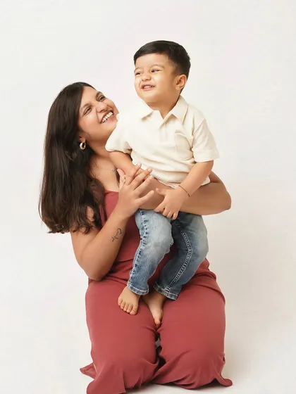 A mother holds her son, and they share a look of pure joy. I aim to capture the authentic emotions that you'll want to remember forever.