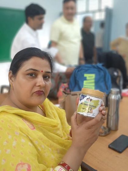 This customer holds a jar of our Amla Candy, showcasing it with pride. We are thankful for every single person who chooses Daadi Naani.