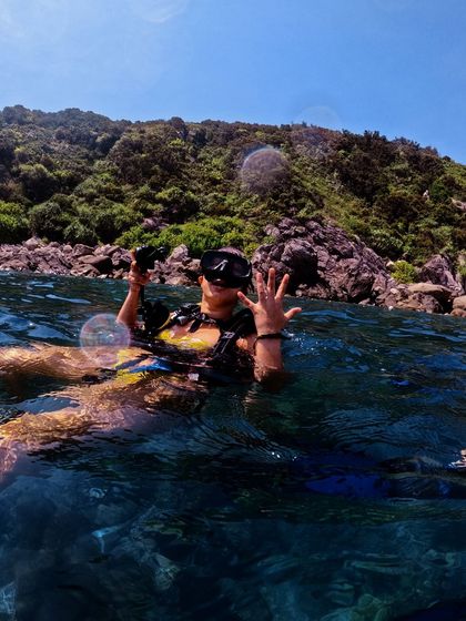 Getting ready for a scuba dive in Vietnam. Staying active keeps me ready for any physical challenge, on land or in the water.