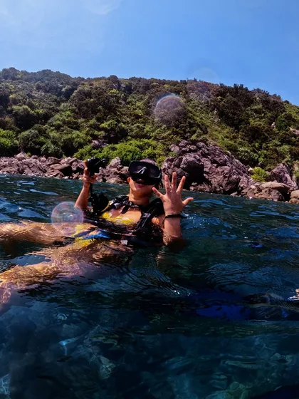 Getting ready for a scuba dive in Vietnam. Staying active keeps me ready for any physical challenge, on land or in the water.